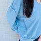 Dusty Blue Raw Edge Knit Top